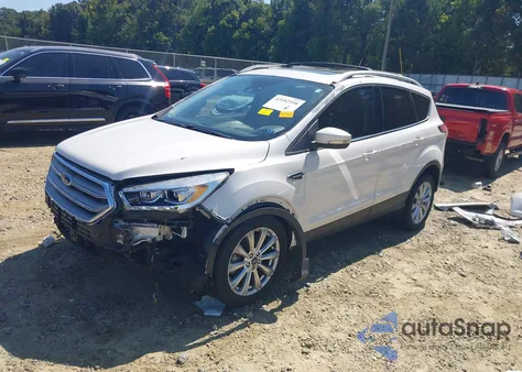 2017 Ford Escape Titanium z USA, uszkodzony, nr VIN 1FMCU9JD7HUA31317